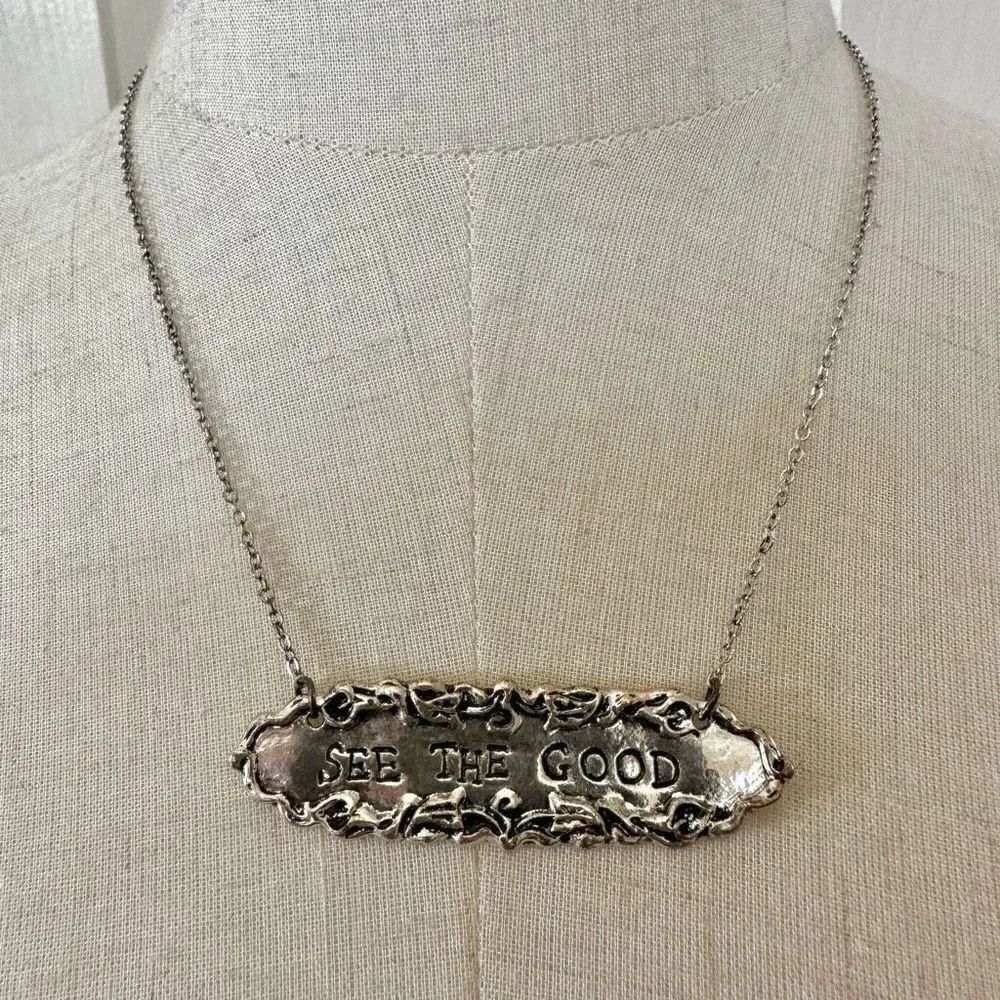 Plunder See The Good silver tone pendant necklace